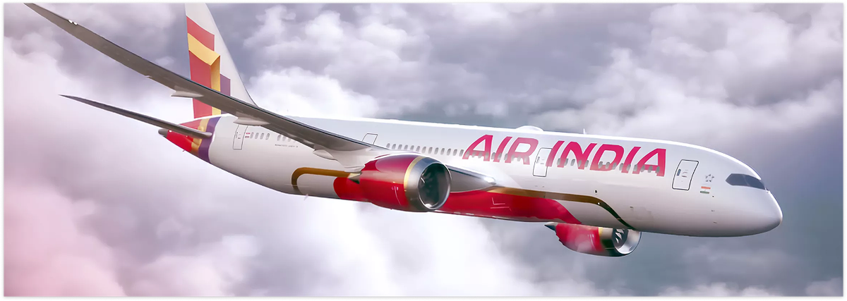 Air India aircraft with new livery flying above clouds
