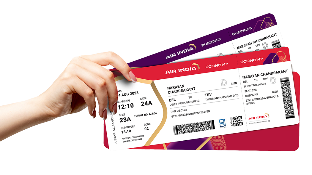 Hand holding Economy and Business boarding passes