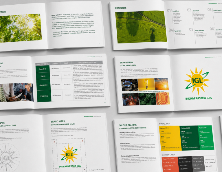 IGL brand guidelines book open to a spread with logo construction and brand pillars